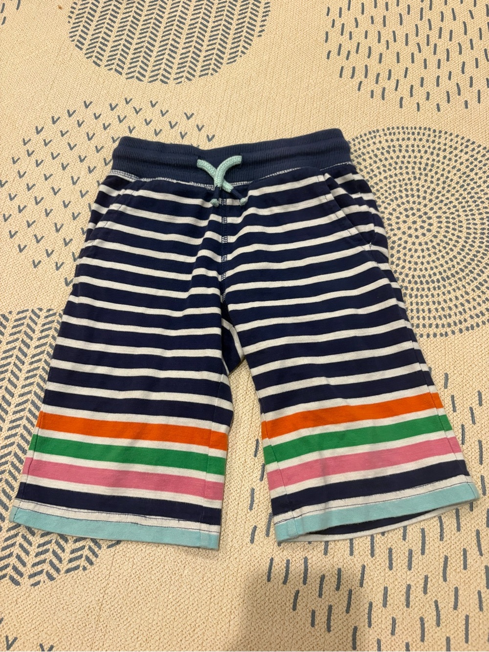Mini Boden jersey baggies Navy & White Striped Shorts with Rainbow Hem